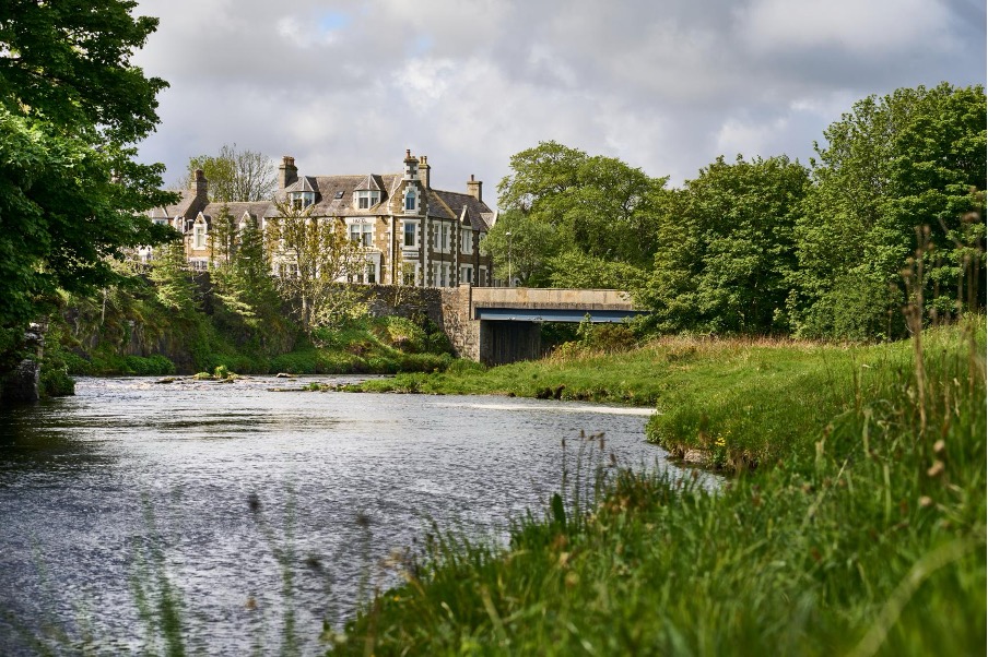 Nomadic Scotland Partner hotel: The Ulbster Arms sitting on the banks of the river.